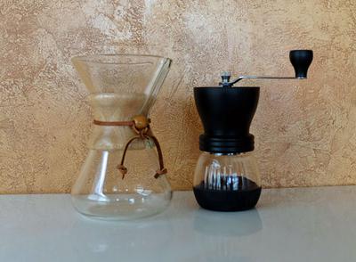 A Chemex brewer and Kyocera hand coffee grinder.