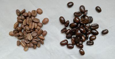 The dark-roasted coffee beans are the ones with the oily sheen on the right.