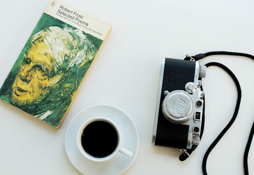 Coffee, book and camera