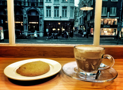 Inside a coffee shop looking out to the street.