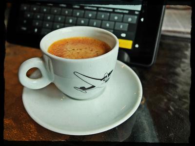 Kindle keyboard and espresso.