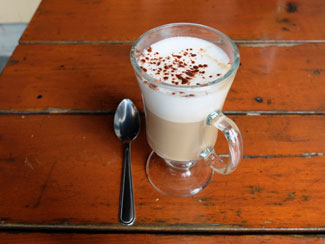 Cafe Latte served on an outdoor terrace after lunch