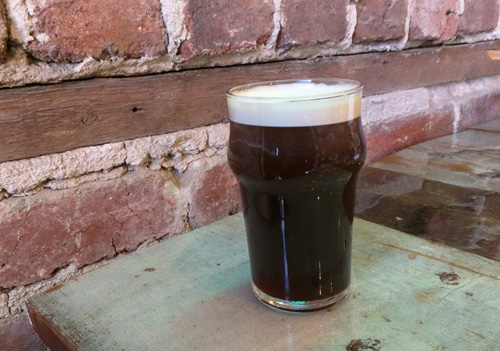 A glass of nitro cold-brew coffee.