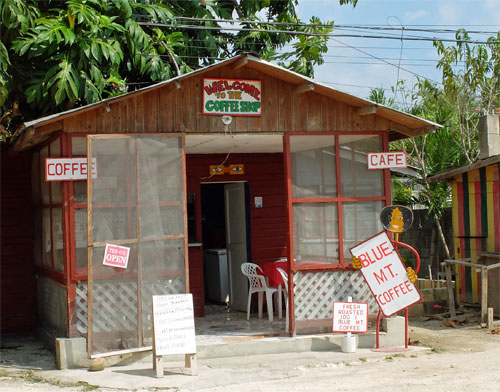 roadside cafe with blue mountain coffee sign