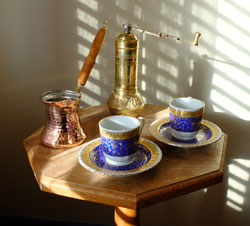 Turkish coffee grinder, ibrik and cups