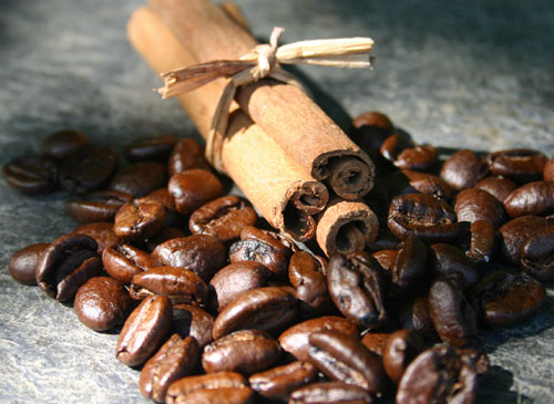 Coffee beans and cinnamon sticks.