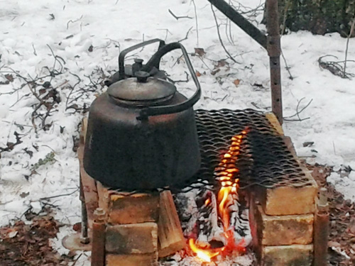 Cowboy coffee making in the snow.