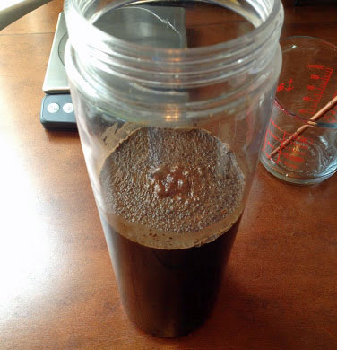 Mix ground coffee and water.