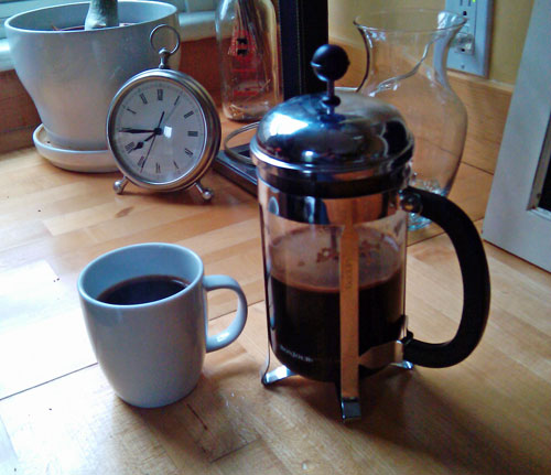 French press and clock.