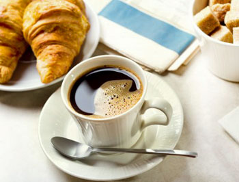 french roast coffee and croissant