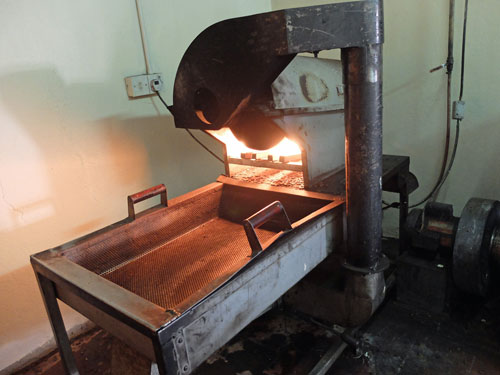 A simple coffee roaster in Kingston Jamaica.